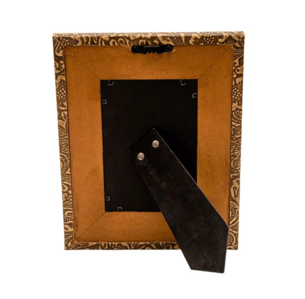 Embossed picture frame