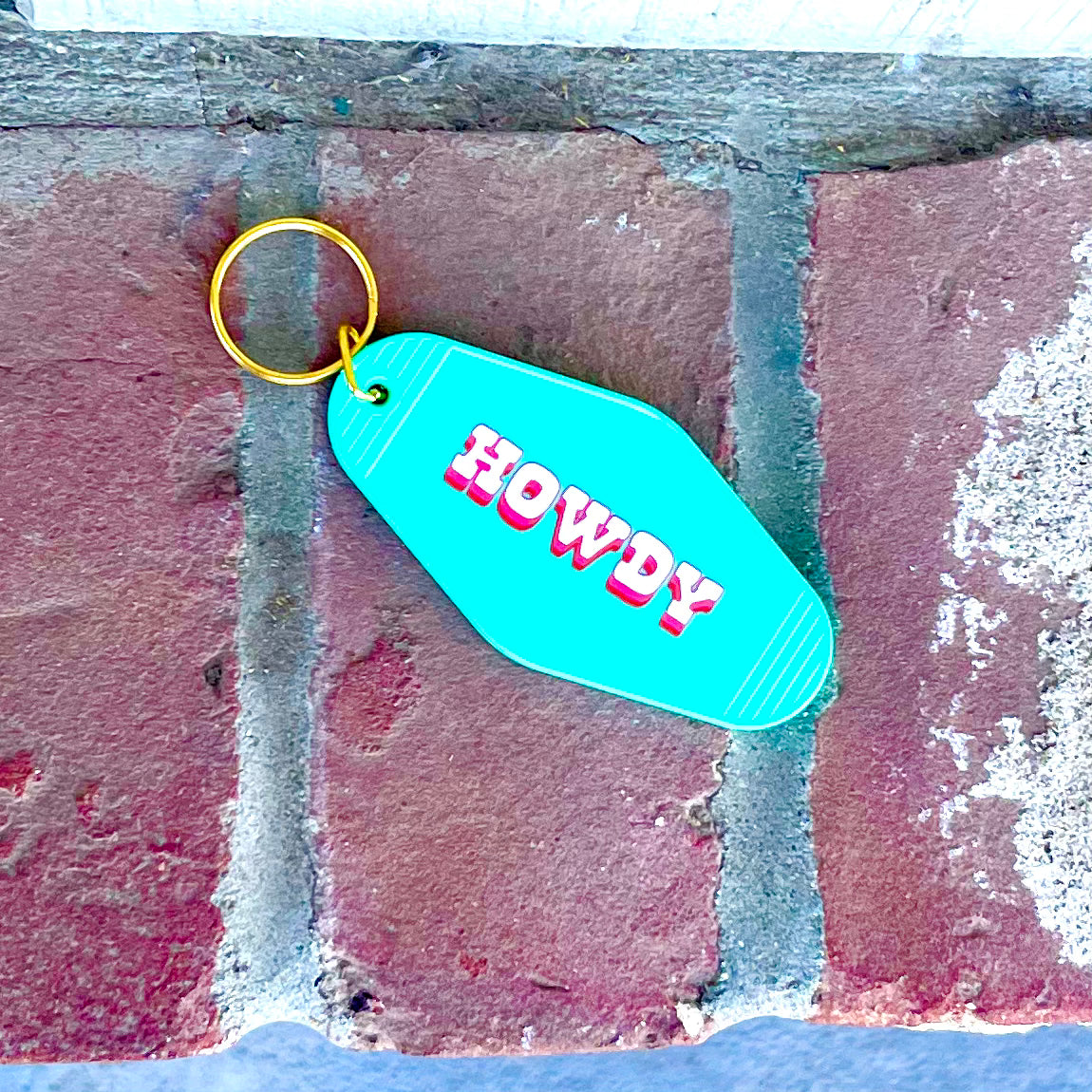 Howdy motel key chain