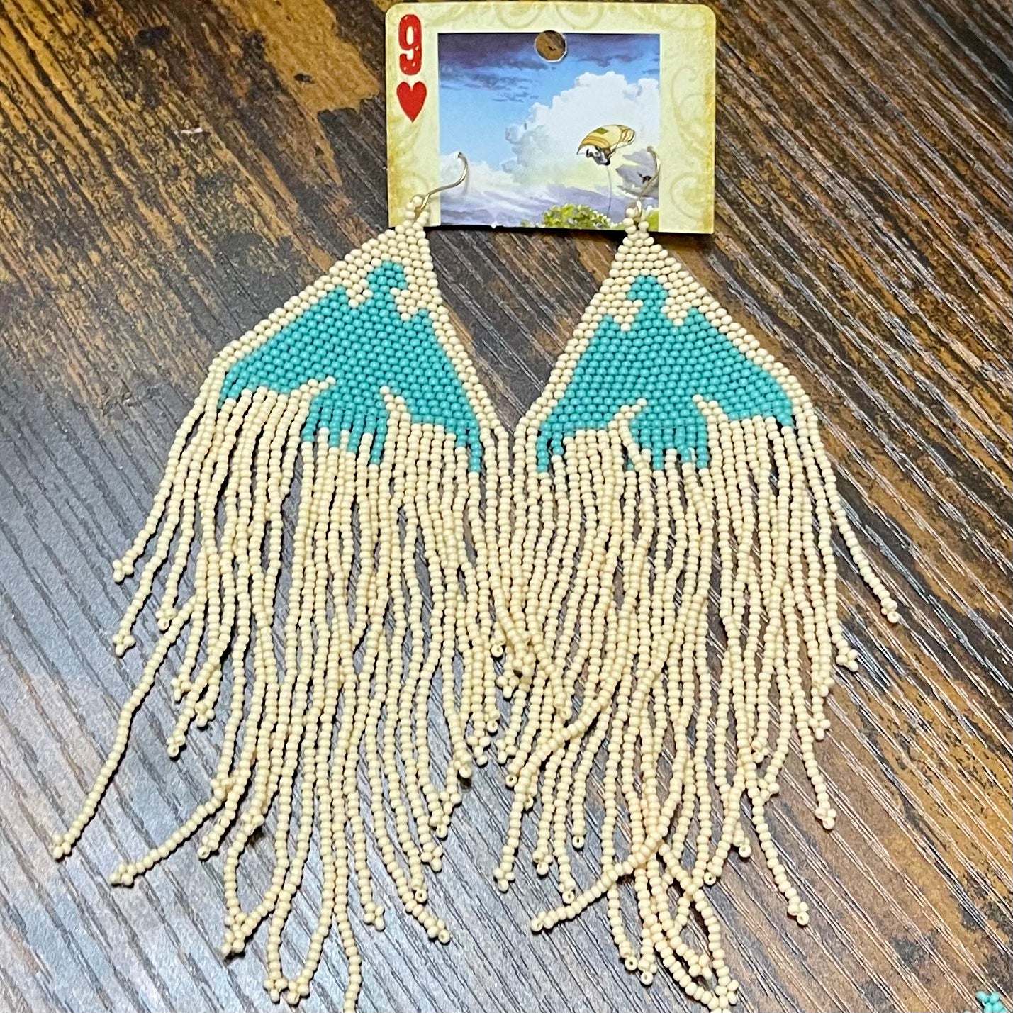 Beaded thunderbird earrings